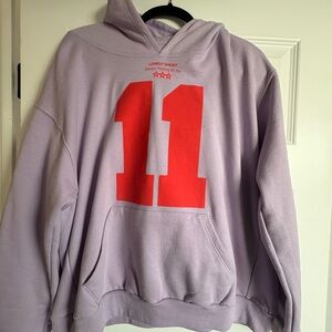 LONELY GHOST Purple Hoodie with Bold Red Graphic